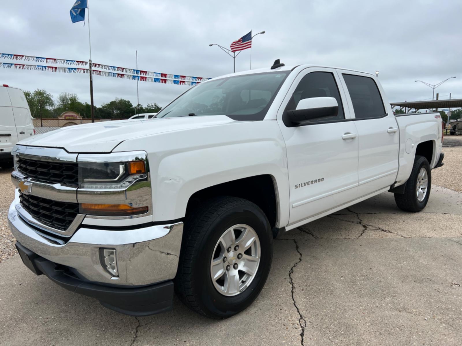 2018 White /Gray Chevrolet Silverado 1500 LT (3GCUKREC2JG) with an 5.3L V8 engine, Automatic transmission, located at 4520 Airline Hwy, Baton Rouge, LA, 70805, (225) 357-1497, 30.509325, -91.145432 - 2018 Chevrolet Silverado Crew Cab LT 4X4 5.3 V8 Gas, 142K Miles, Power Windows, Locks & Mirrors, Cold A/C, Transmission Has 12 Month Warranty, Tow Pkg, Good Tires. FOR INFO PLEASE CONTACT JEFF AT 225 357-1497 CHECK OUT OUR A+ RATING WITH THE BETTER BUSINESS BUREAU WE HAVE BEEN A FAMILY OWNED AND OPE - Photo #0